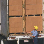 Marvatex worker loading up truck to transport products