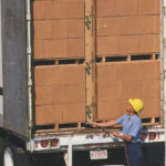 Marvatex worker loading up truck to transport products