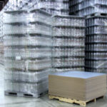 photo of cans stacked on top of each other packaged using Marvatex tier sheets